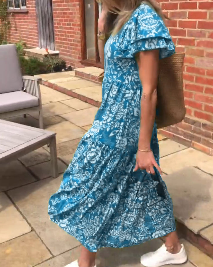 Emmas® | Lange jurk met korte mouwen en bloemenprint