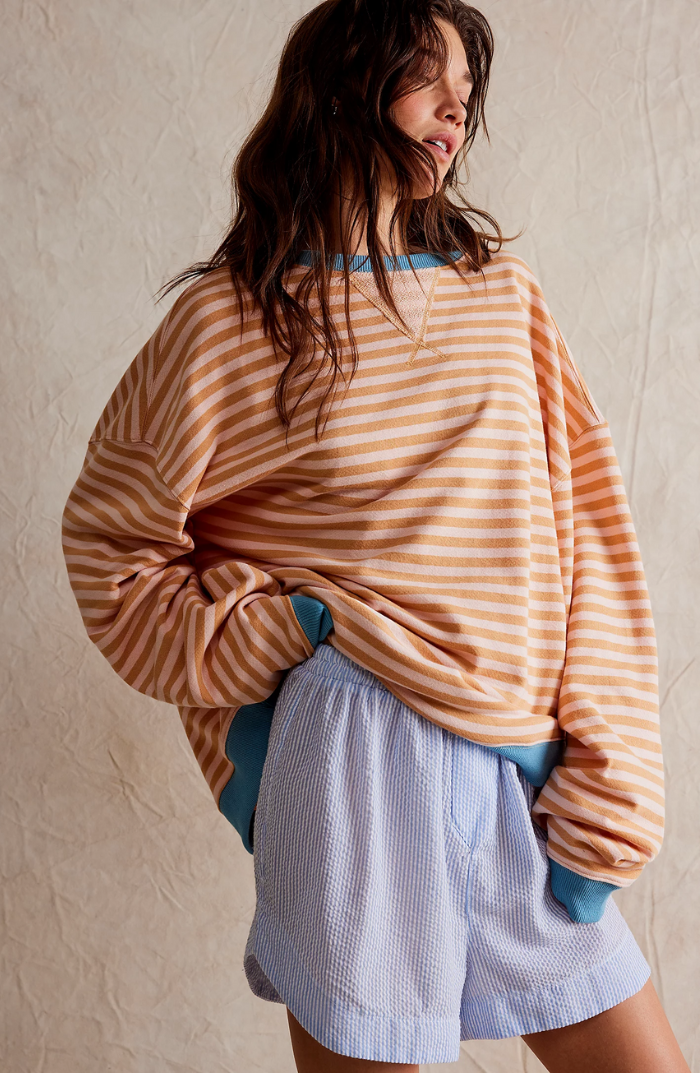 Catje - Oversized Trui met Levendige Strepen