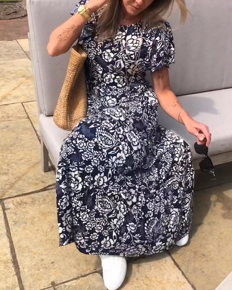 Emmas® | Lange jurk met korte mouwen en bloemenprint