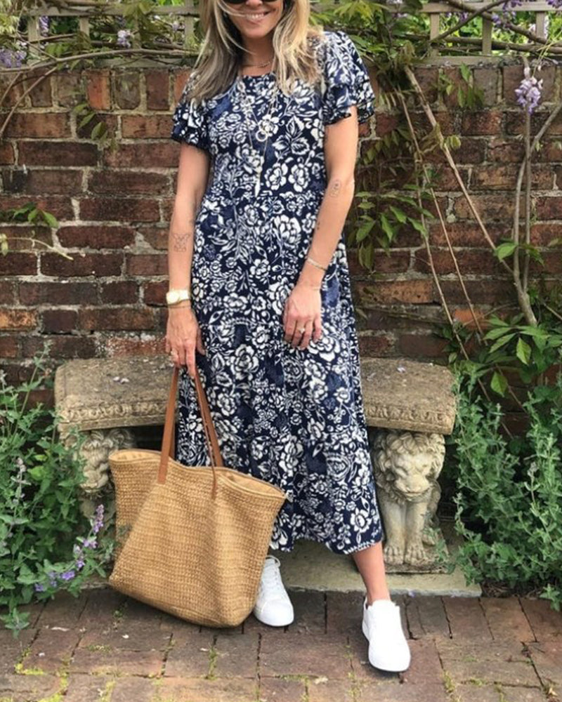 Emmas® | Lange jurk met korte mouwen en bloemenprint