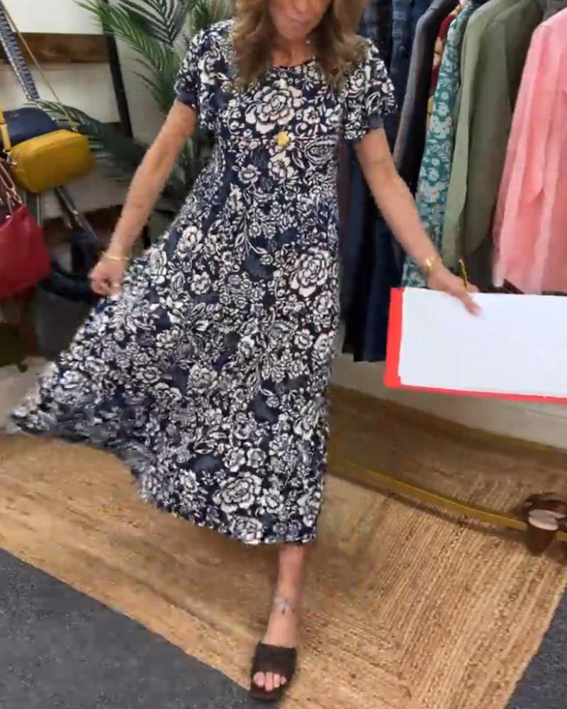 Emmas® | Lange jurk met korte mouwen en bloemenprint