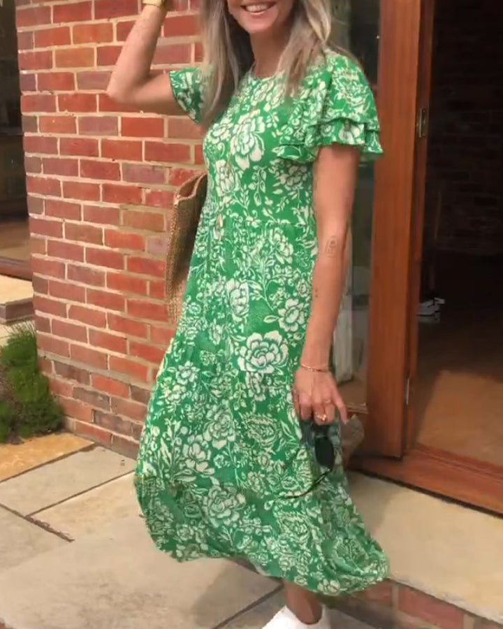 Emmas® | Lange jurk met korte mouwen en bloemenprint