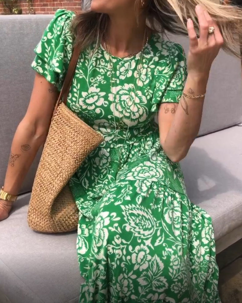 Emmas® | Lange jurk met korte mouwen en bloemenprint